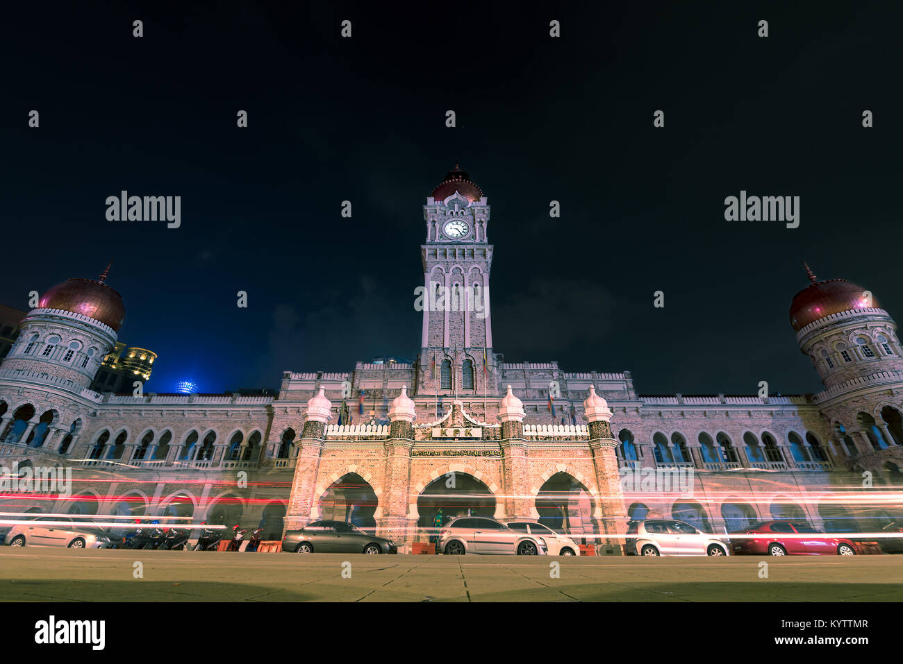 Sultan Abdul Samad Building, Kuala Lumpur, Malaysia. Night time photo of the impressive building, its towers and copper domes. Stock Photo