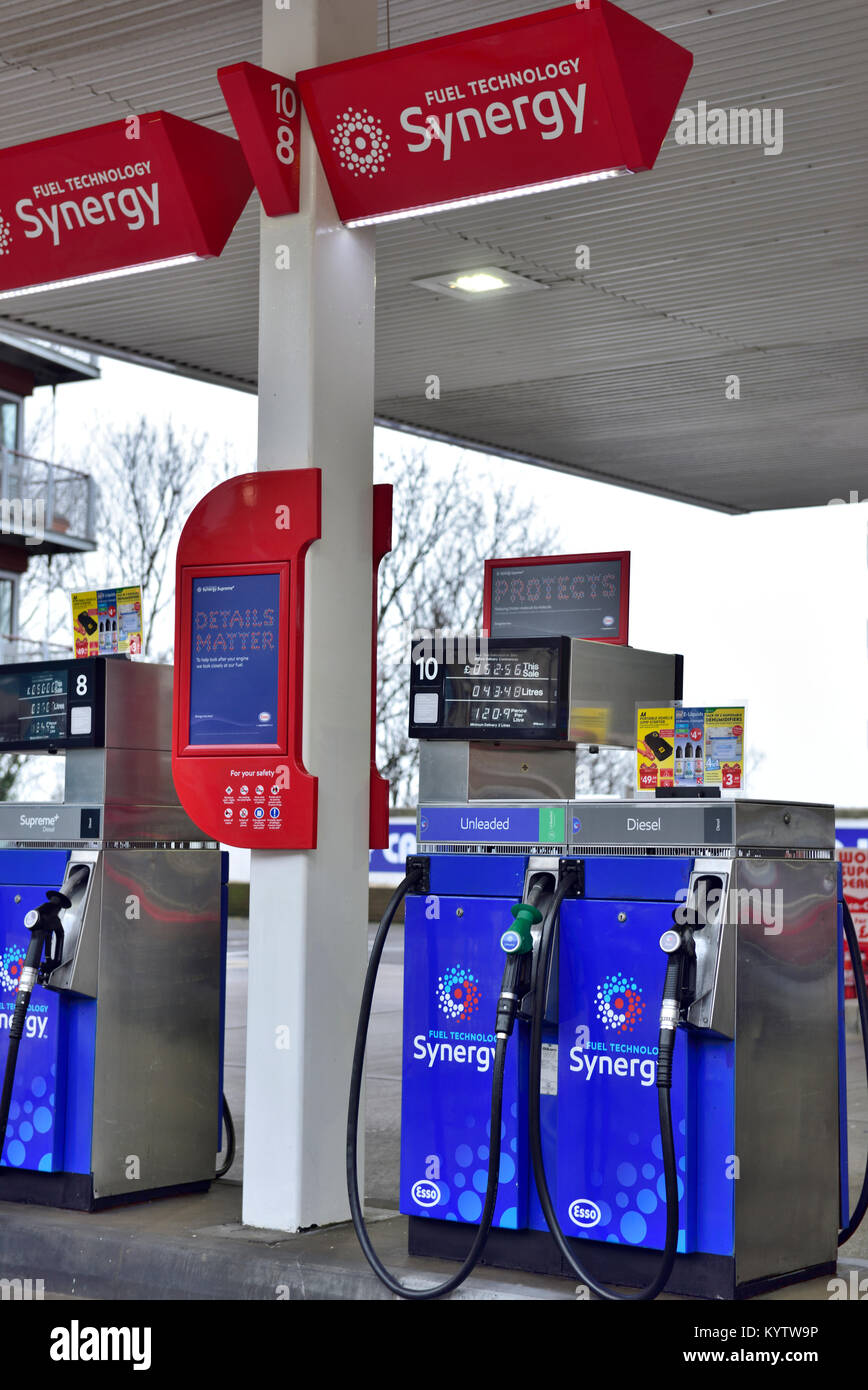 Fuel pumps on petrol station forecourt with both petrol and diesel pumps Stock Photo