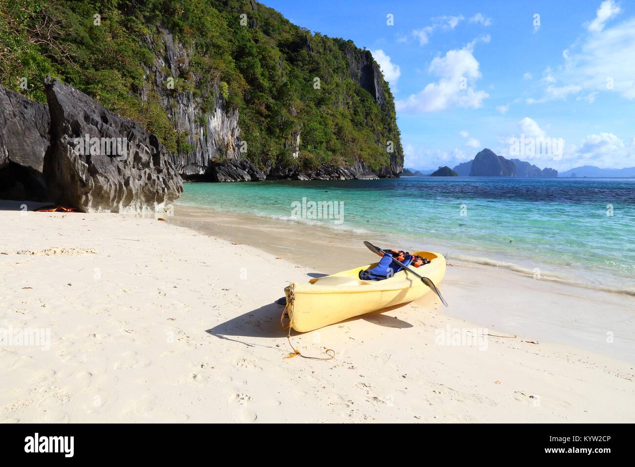 Sea kayaking in Palawan island, Philippines. Visiting Papaya Beach