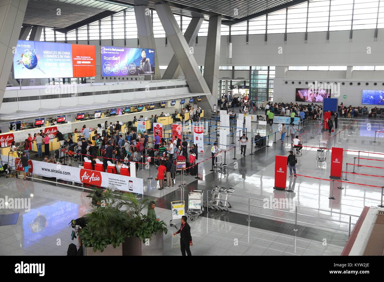 MANILA, PHILIPPINES - DECEMBER 8, 2017: People wait at Ninoy Aquino International Airport in Manila, Philippines. The airport handles 36.7 million pas Stock Photo