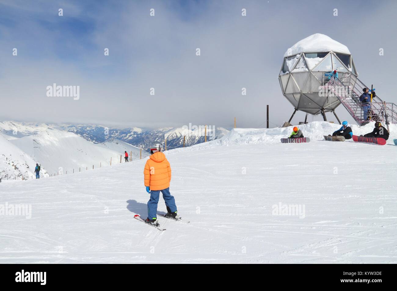 GASTEIN VALLEY, AUSTRIA - MARCH 10, 2016: People visit Sportgastein ski resort in Austria. It is part of Ski Amade, one of largest ski regions in Euro Stock Photo