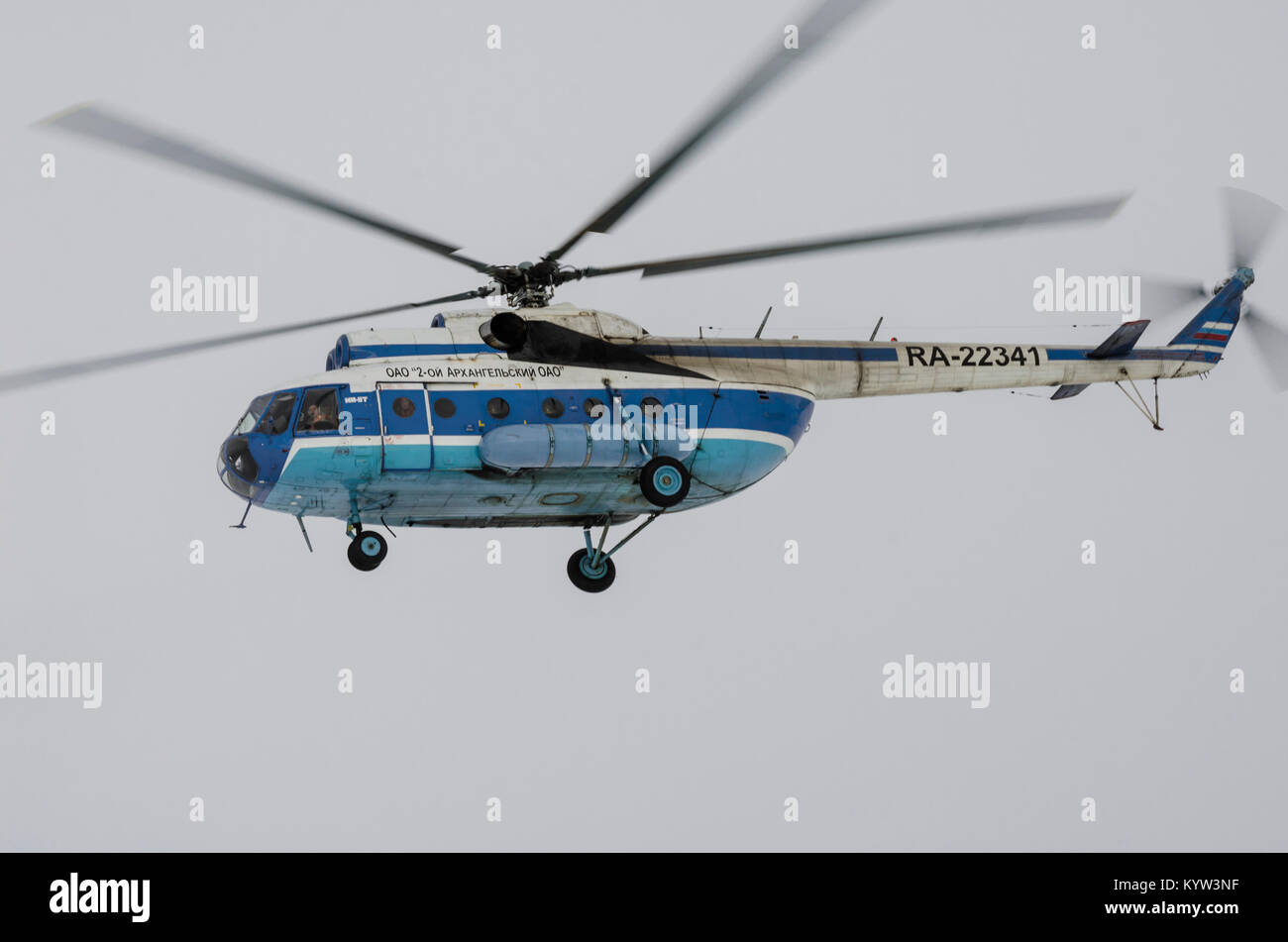 The Russian Mi-8 helicopter landed an assault on the ice in the White Sea. Russia, Arkhangelsk region, Mezensky district. Stock Photo