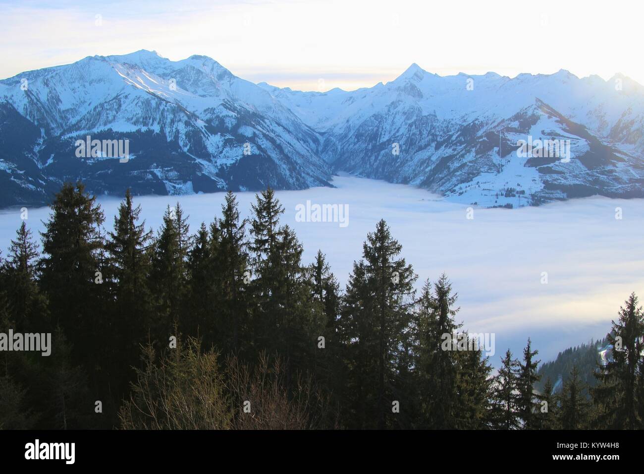 View of the Hohe Tauern mountain range with mountain Kitzsteinhorn (3200 m) in the region Zell am See - Kaprun, in winter. Austria, Europe. Stock Photo