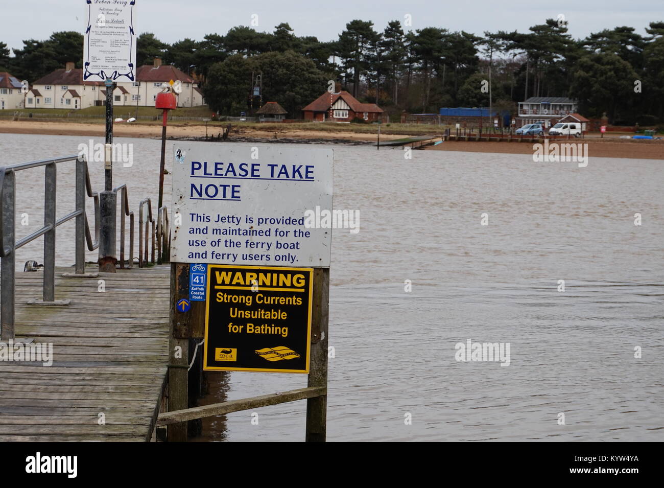 A sign located next to the jetty at Felixstowe Ferry. The ferry runs from Felixstowe Ferry across the River Deben to Bawdsey. Stock Photo