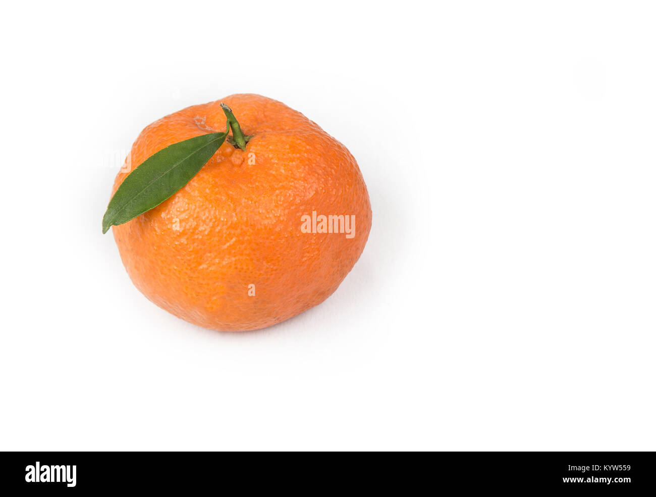 Tangerine or clementine with green leaf isolated on white background