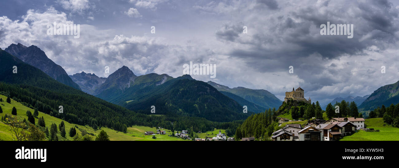 view of the beautiful castle of Tarasp and surrounding mountain ...