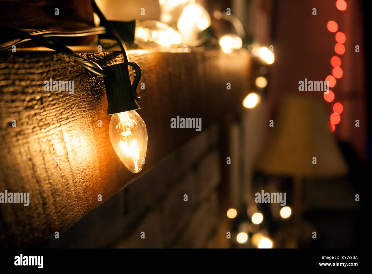 Christmas lights over fireplace Stock Photo Alamy