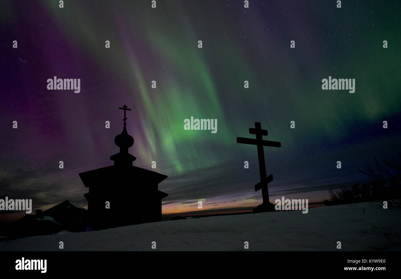 Polar lights above the temple. Russia, Arkhangelsk region, Primorsky district, Solovki Stock Photo