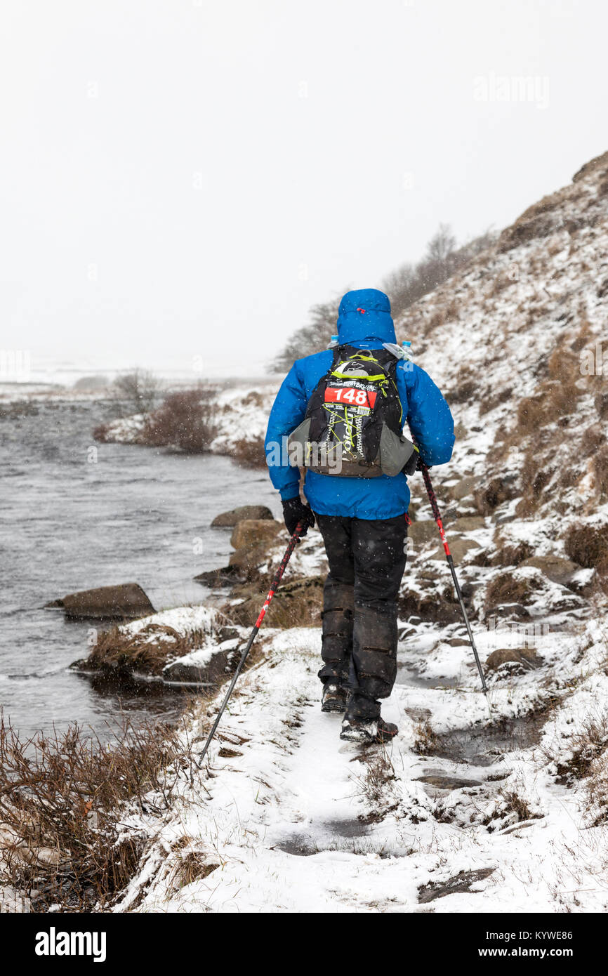 Upper Teesdale, County Durham UK. Tuesday 16th January 2018. This competitor faced some tough winter conditions as he passed through Upper Teesdale in County Durham, UK, this morning. The 426km long Montane ® Spine ® Race is a gruelling none stop 7 day race and is one of the toughest mountain races in the world. The race starts in Edale and follows the Pennine Way, to finish in Kirk Yethholm in Scotland. Credit: David Forster/Alamy Live News Stock Photo