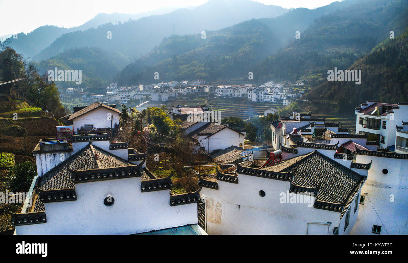 (180117) -- PINGLI, Jan. 17, 2018 (Xinhua) -- Photo taken on Jan. 16, 2018 shows the scenery of Longtou Village of Pingli County, northwest China's Shaanxi Province. Pingli County now has 12,000-hectare ecological tea and 3,333-hectare Fiveleaf Gynostemma Herb. The planting industry plays a leading role in the local economic development. (Xinhua/Tao Ming)(wsw) Stock Photo