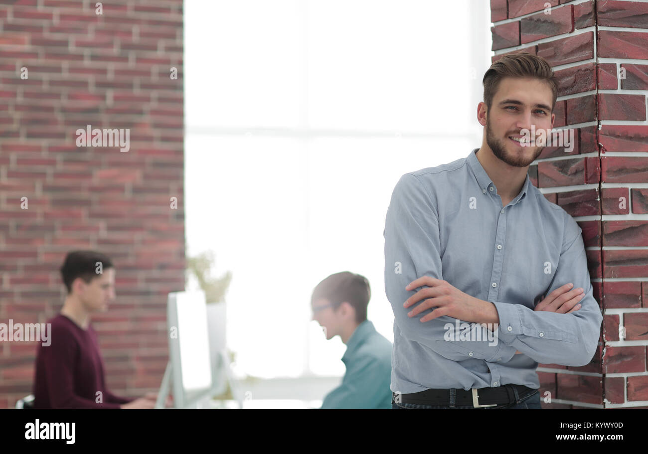 Handsome smiling confident businessman portrait Stock Photo - Alamy