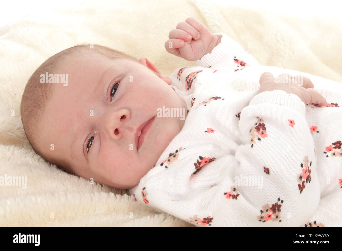 baby girl on rug Stock Photo Alamy
