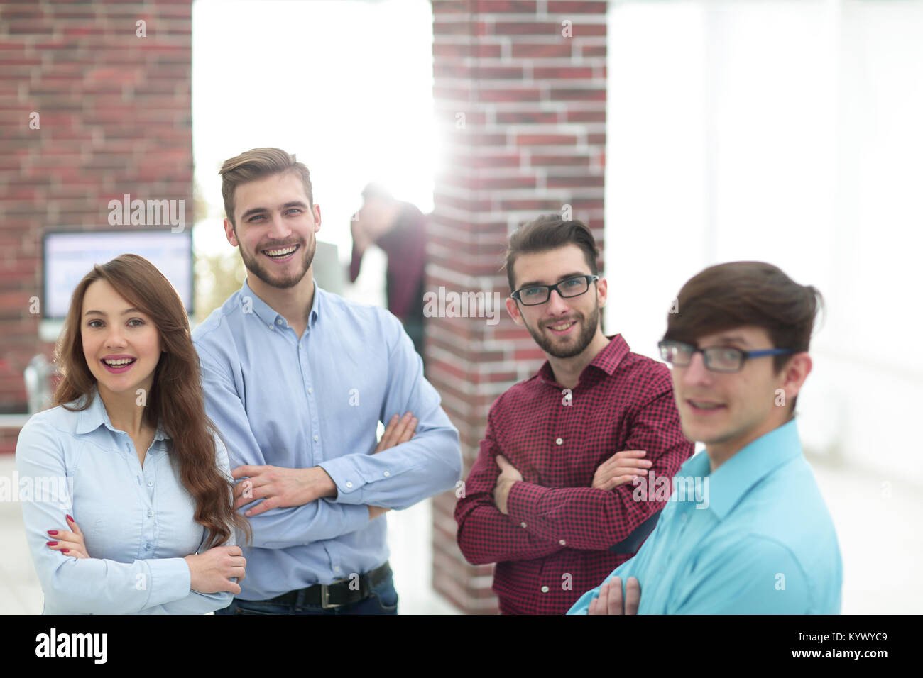 Happy smiling business team in office Stock Photo - Alamy