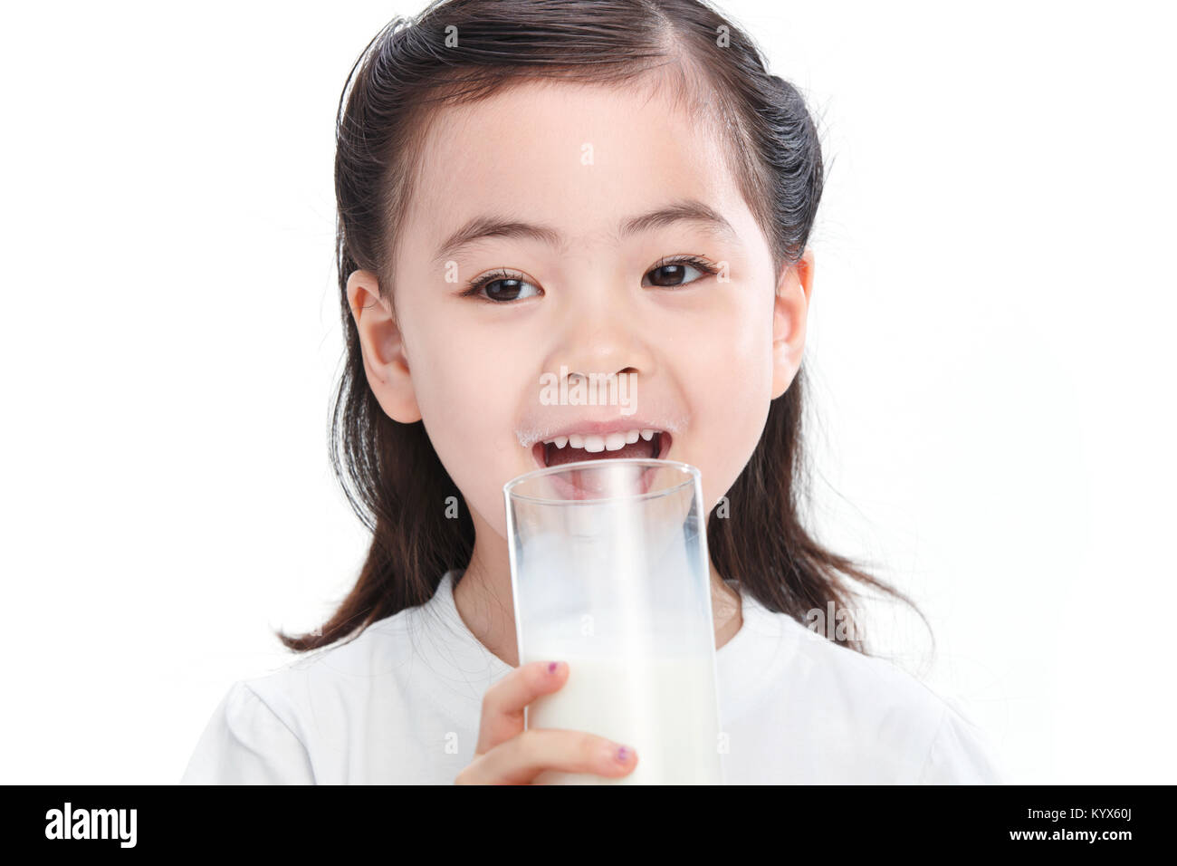 The little girl drank the milk Stock Photo Alamy