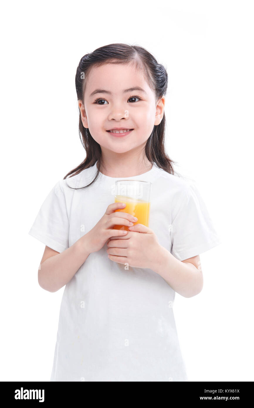 The little girl drinks juice Stock Photo Alamy