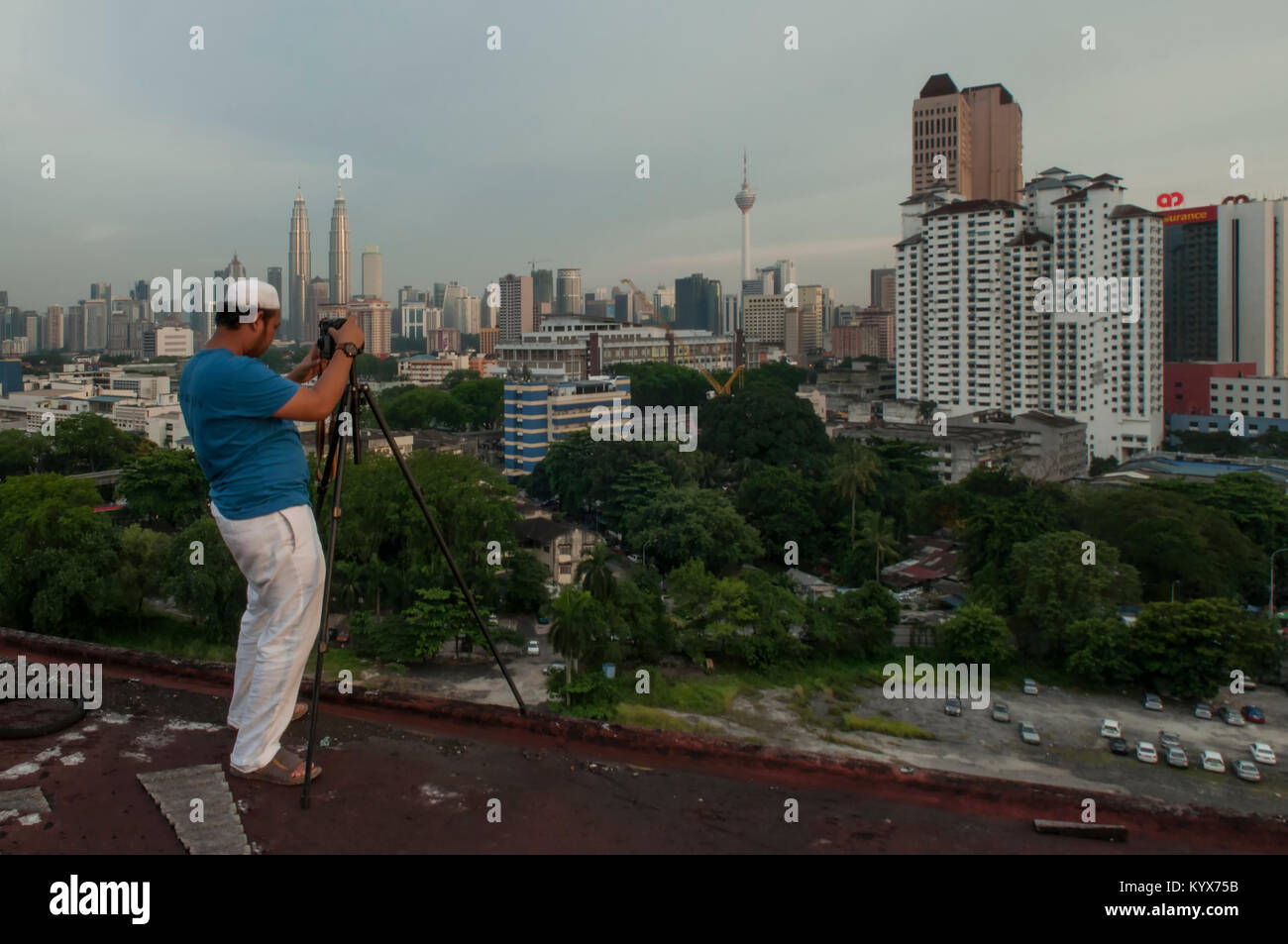 Scene of a photographer capturing Kuala Lumpur city skyline Stock Photo