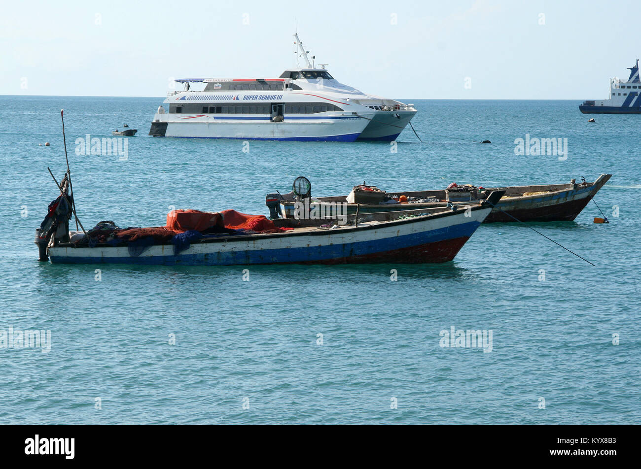 Ships sailing at sea, Stone Town, Zanzibar, Tanzania. Stock Photo