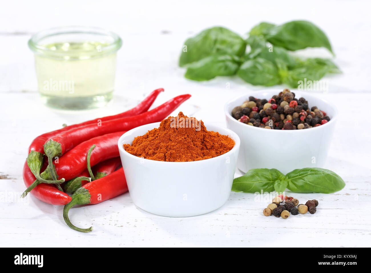 Spices cooking ingredients paprika powder spicy red hot chili peppers chilli spice Stock Photo