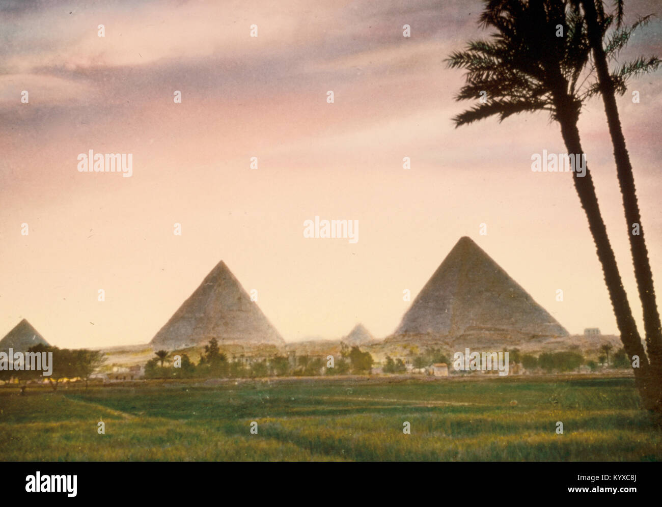 Pyramids. Pyramids silhouetted against strong evening glow Stock Photo