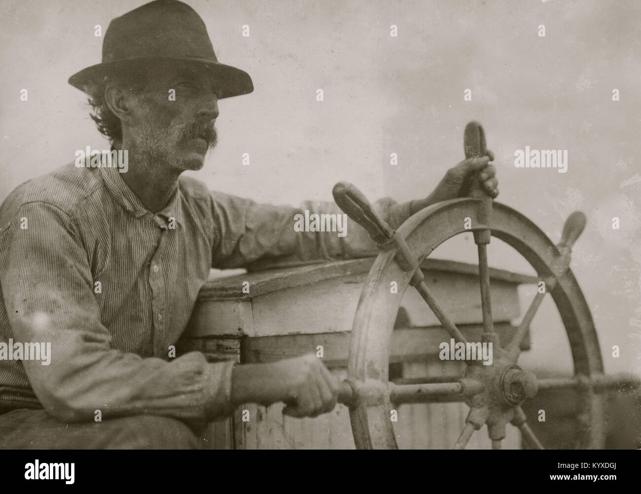 The Skipper on the Oyster Barge, Mobile Bay. Location Bayou La Batre