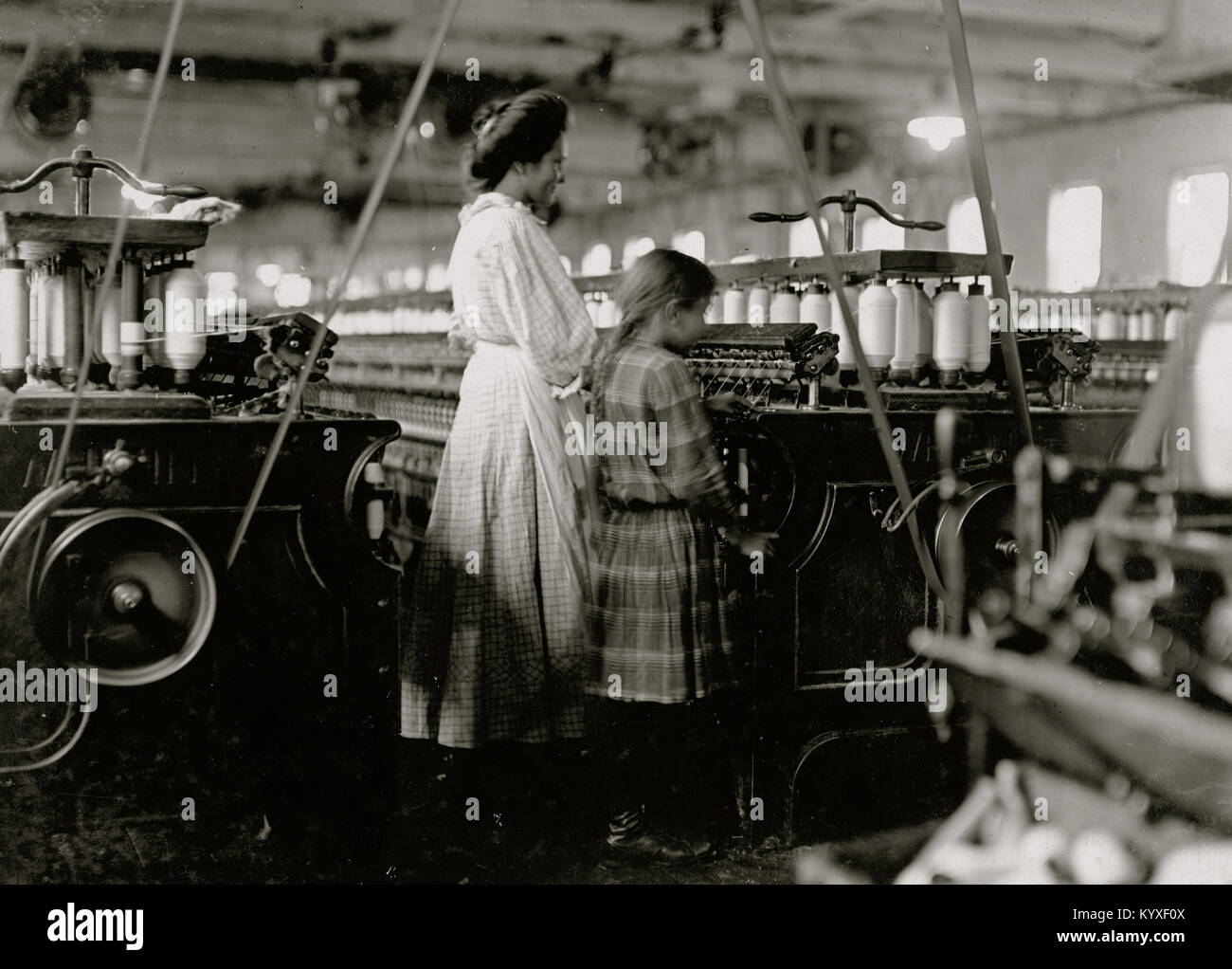 Small Child works in the Cotton Mill Stock Photo