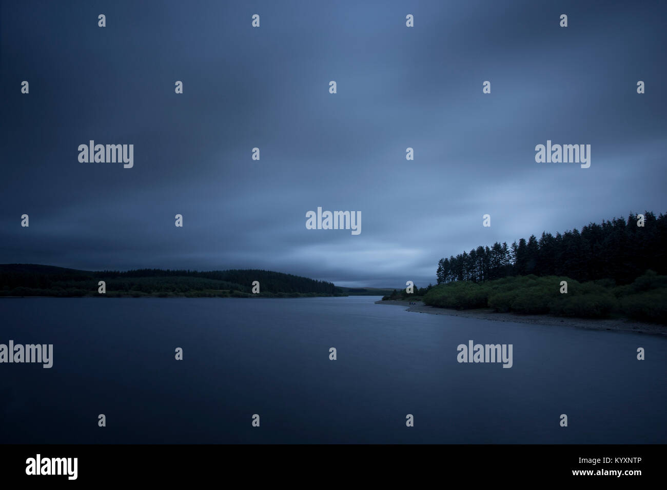 Grey clouds cover the sky over the waters of Alwen Reservoir in mid-Wales Stock Photo