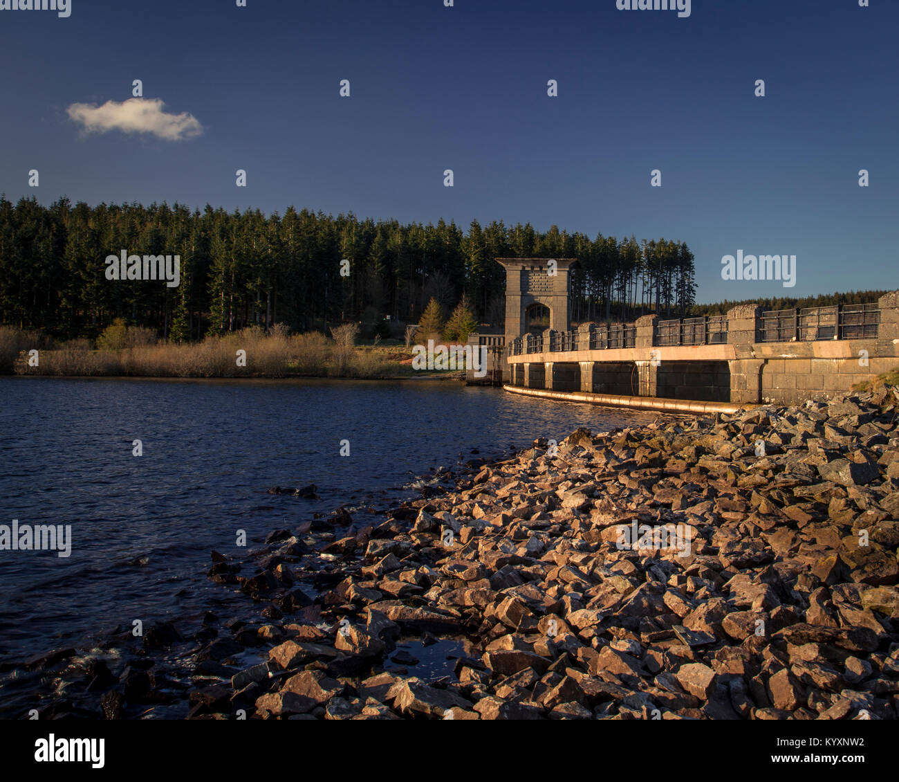 The dam at Alwen Reservoir on a summer's day in North Wales Stock Photo