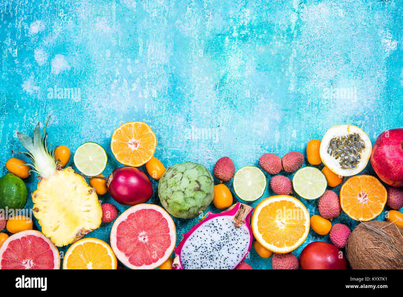 https://c8.alamy.com/comp/KYXTK1/mixed-fresh-vibrant-exotic-fruits-border-background-top-viewcopy-space-KYXTK1.jpg