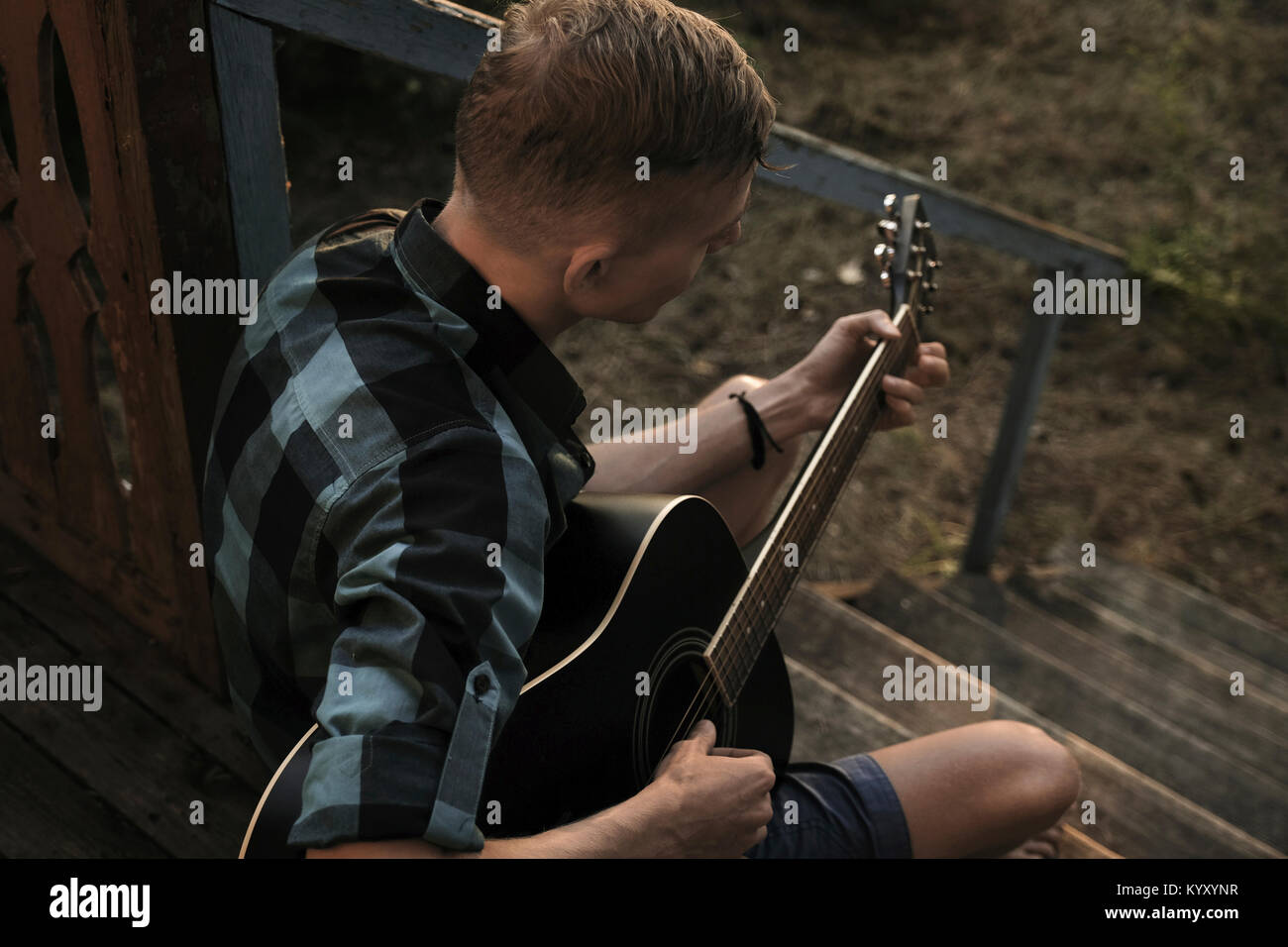 Sitting on porch steps hi-res stock photography and images - Alamy