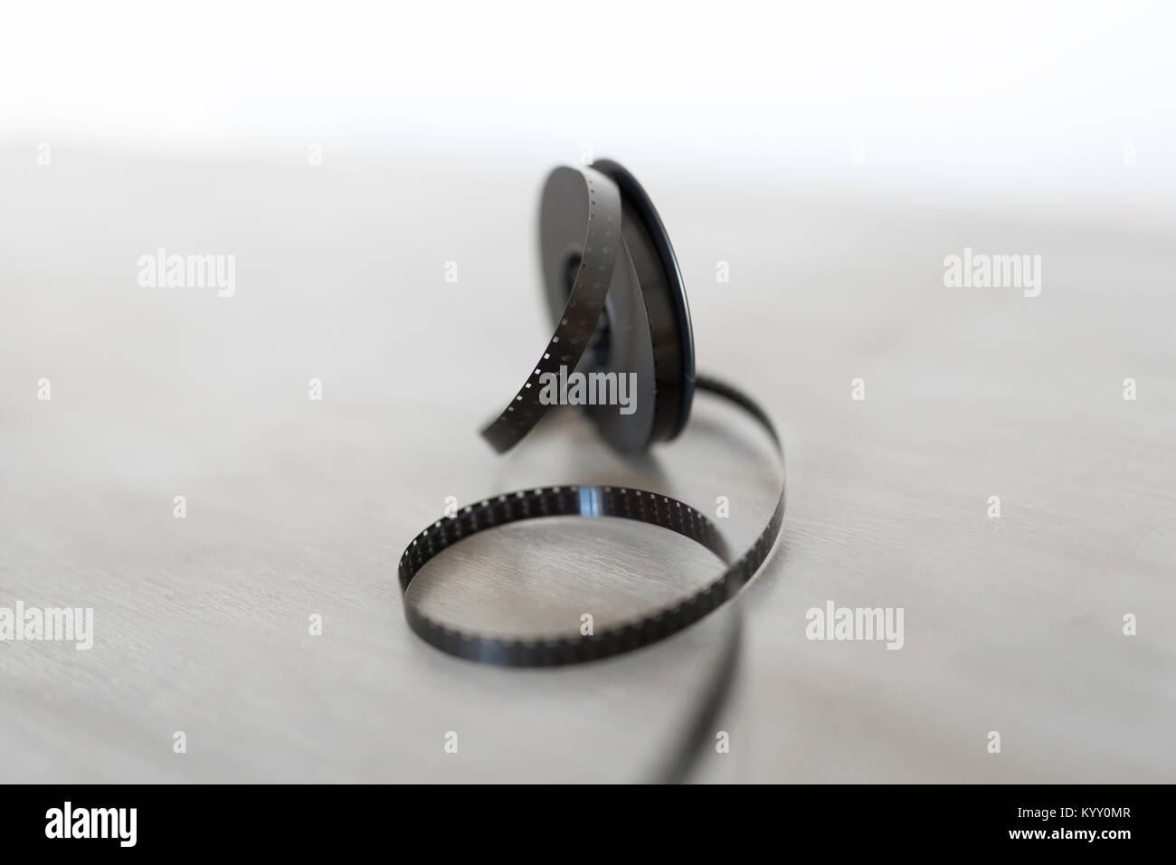 Close-up of film reel on table Stock Photo