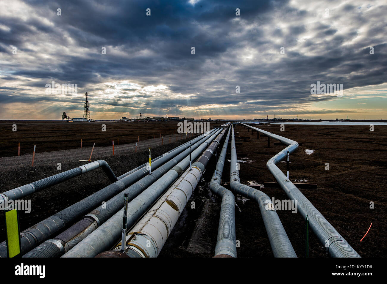 High angle view of Trans-Alaskan Pipeline against cloudy sky during sunset Stock Photo