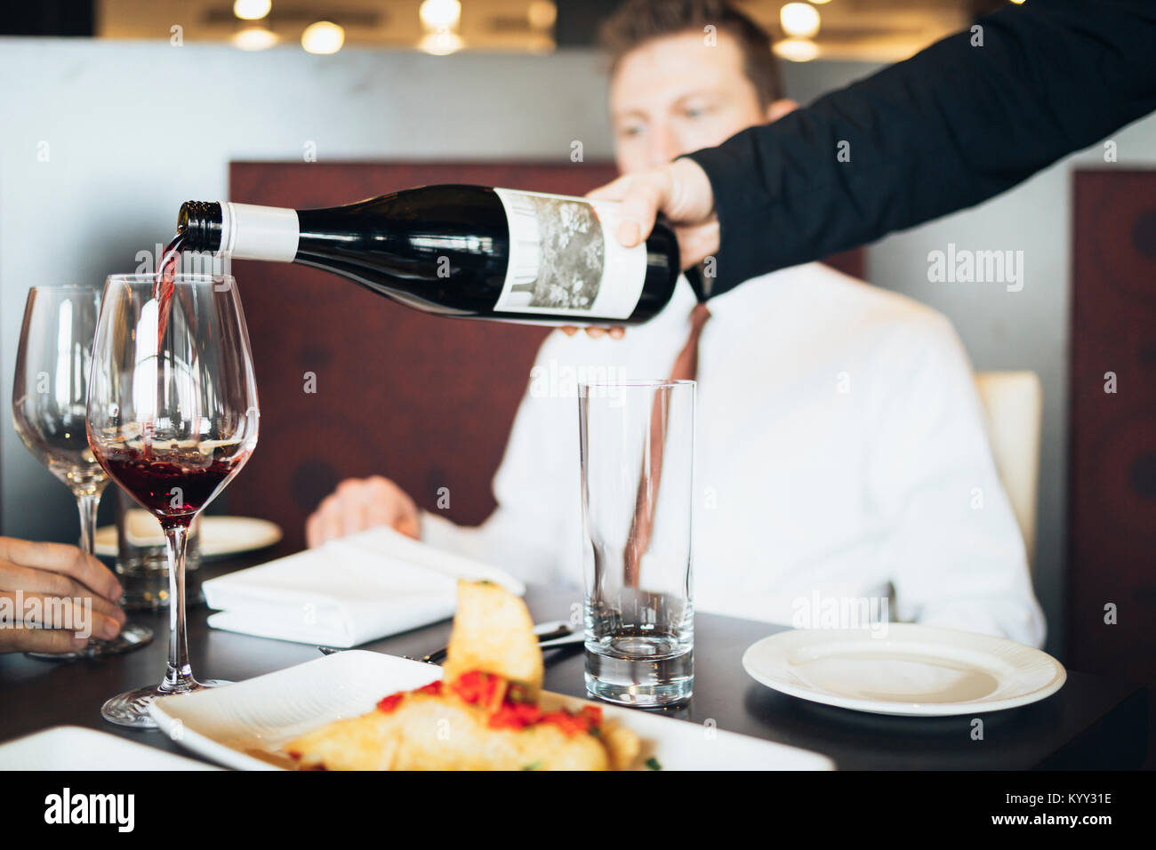 White wine pouring hand hires stock photography and images Alamy