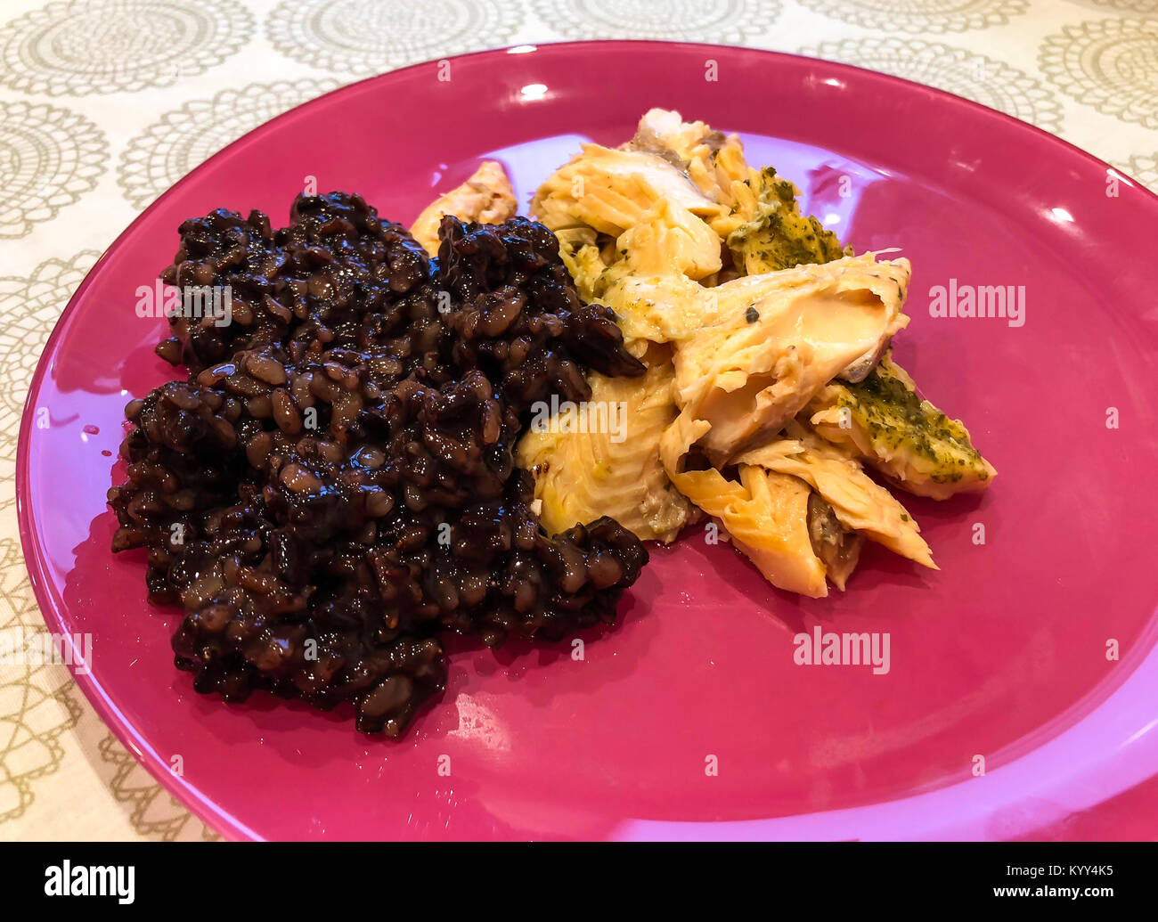 Healthy Eating. Steamed fish fillets and black rice. Studio Photo Stock ...