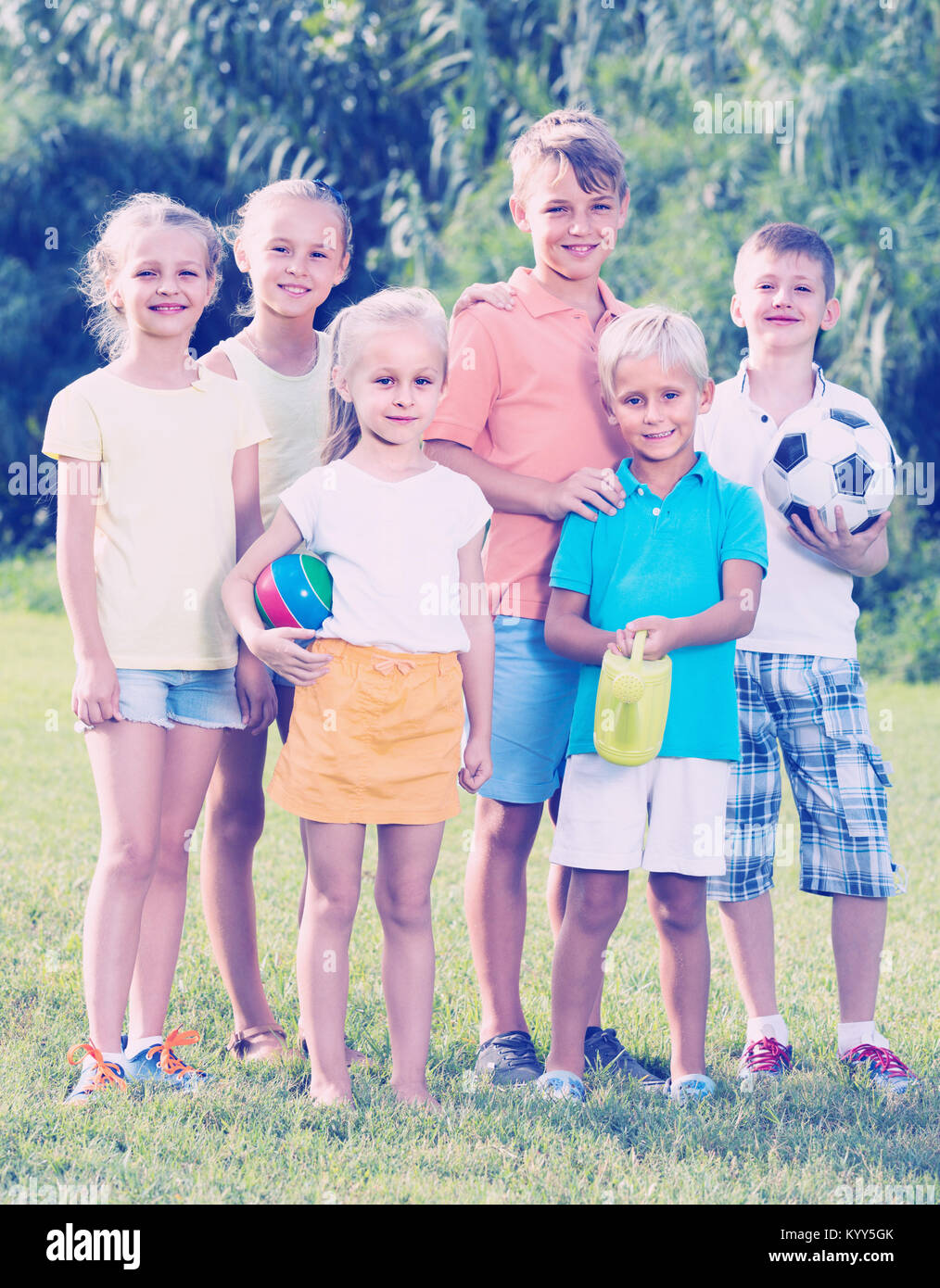 Children holding toys school hi-res stock photography and images - Alamy
