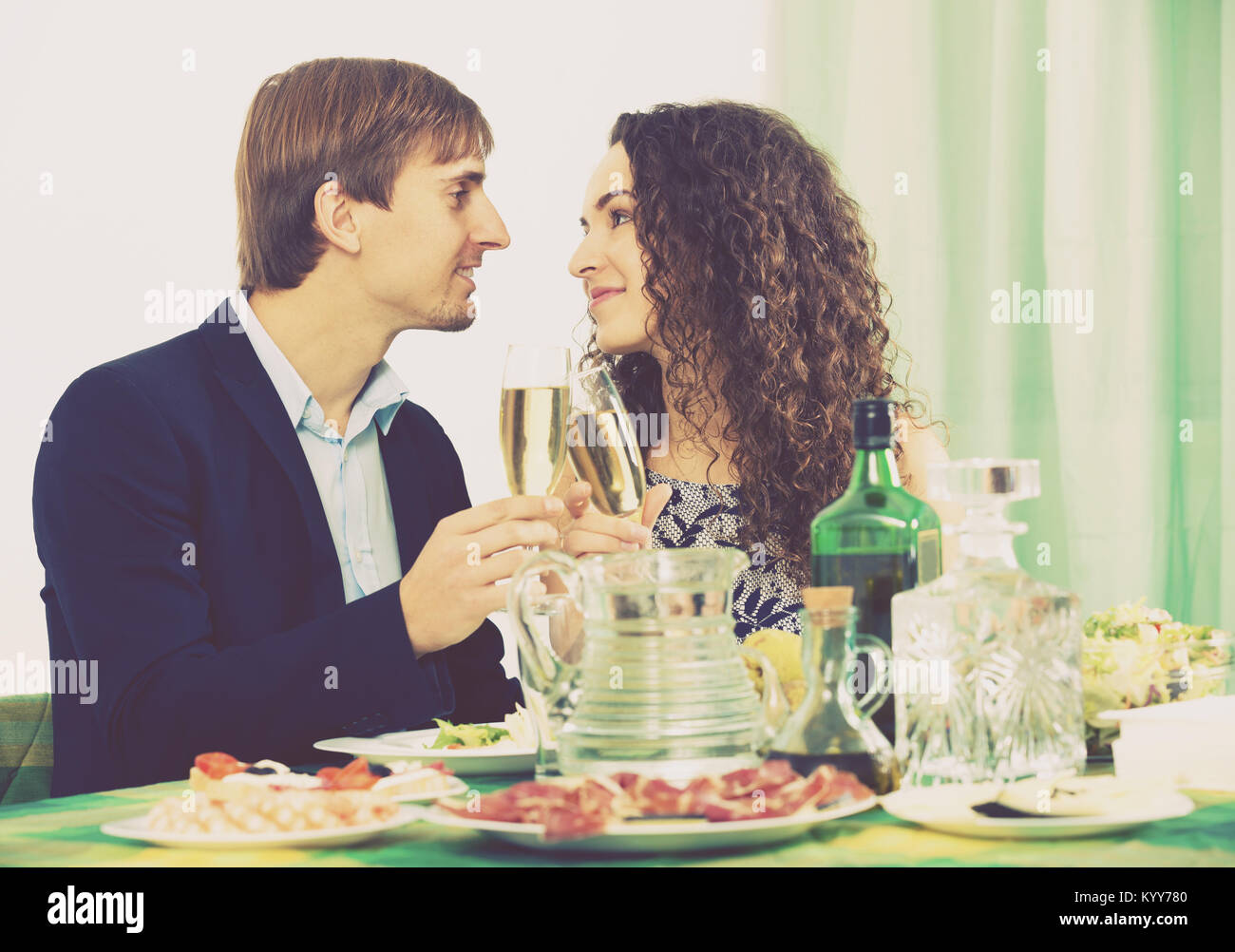 Attaractive man and woman having romantic dinner in home Stock Photo ...