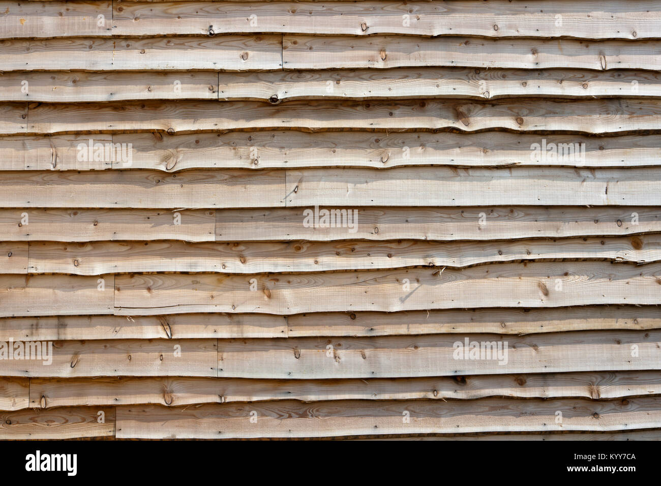 Rustic feather-edge timber wall Stock Photo