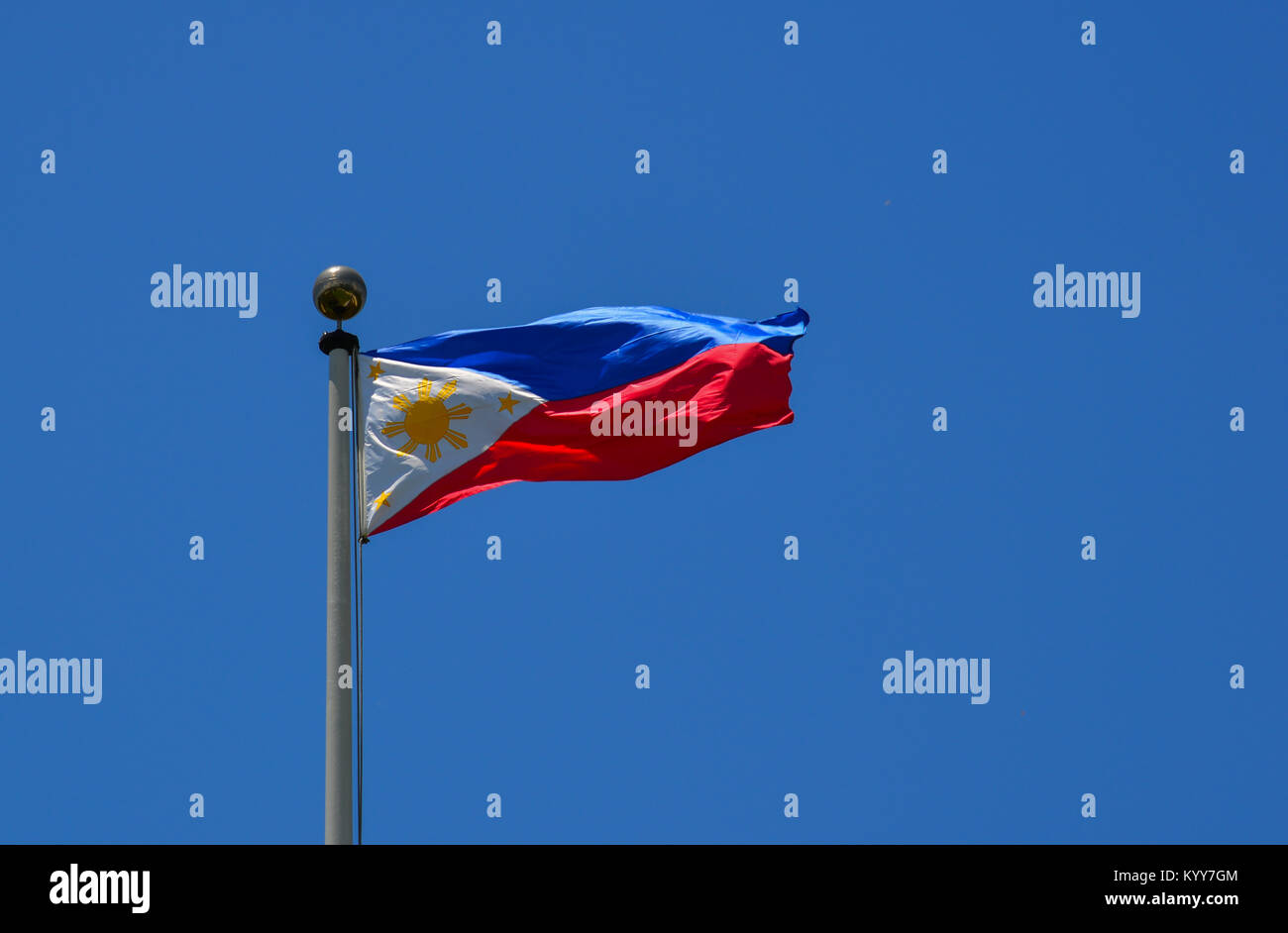 Flag of the Philippines waving in the blue sky Stock Photo - Alamy