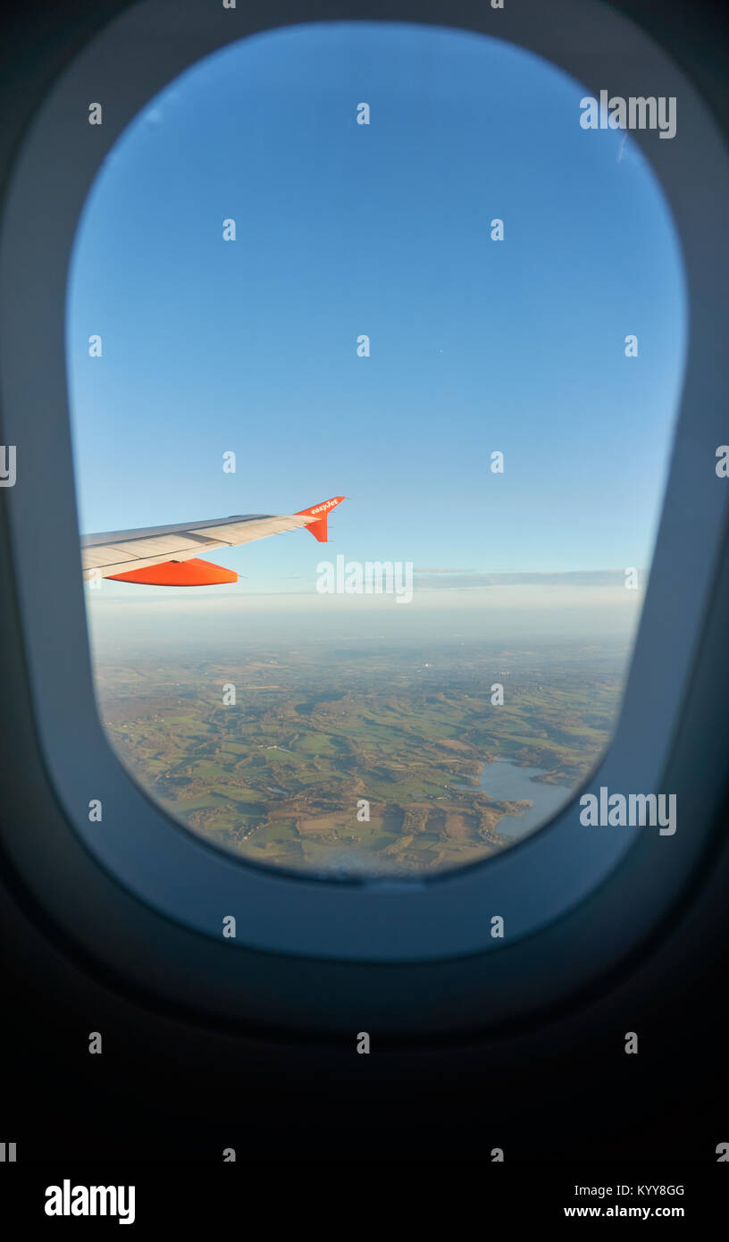 Wingtip of an Easyjet aircraft seen from the cabin. Stock Photo