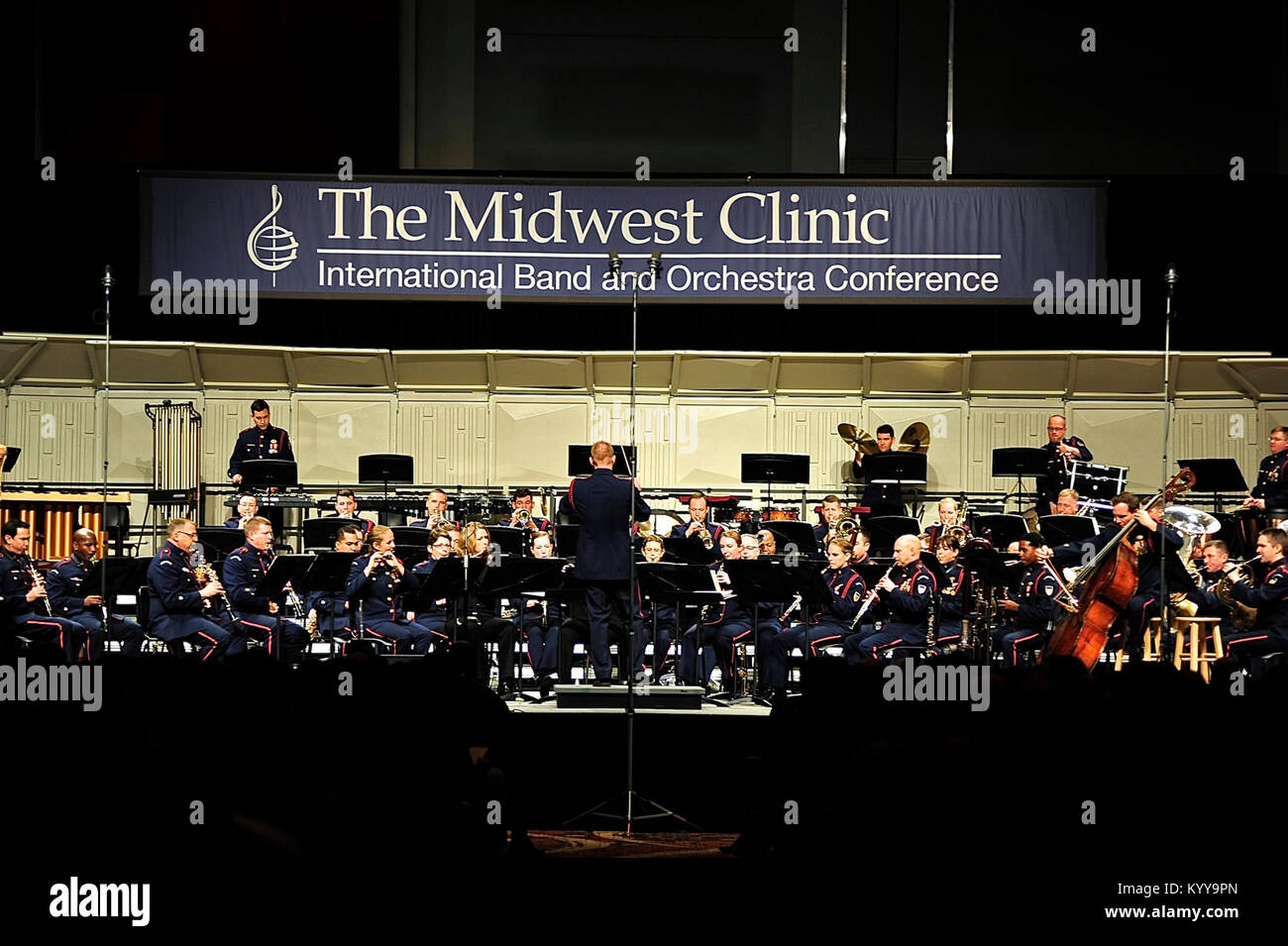 Lt. Cmdr. Adam Williamson conducts the Coast Guard Band during a