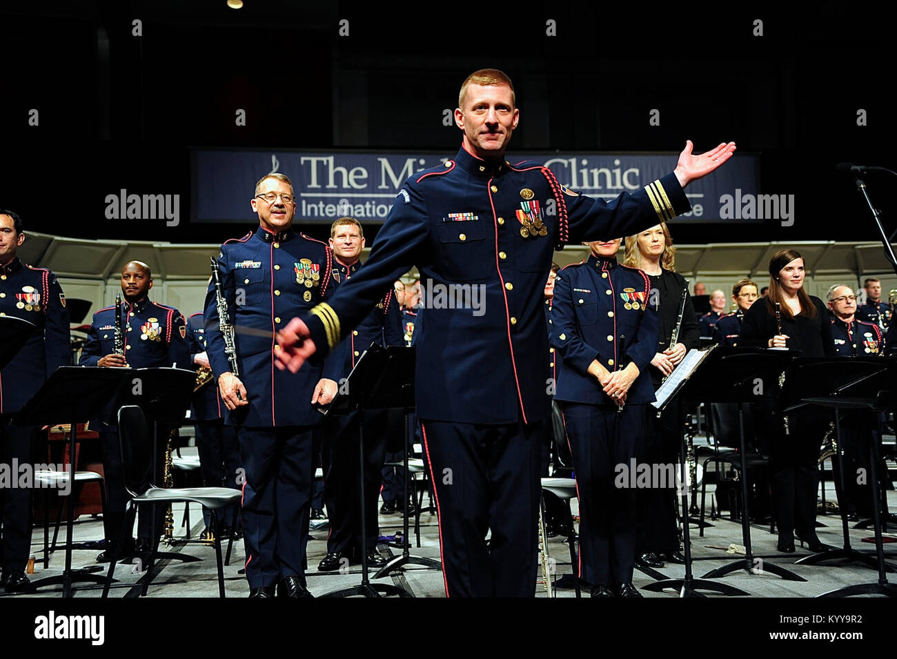 Lt. Cmdr. Adam Williamson and members of the Coast Guard Band acknowledge the audience during a performance in Chicago, Dec. 21, 2017.  The band was the featured service band at this year’s Midwest Clinic International Band and Orchestra Conference attended by more than 17,000 people from all 50 states and more than 30 countries.  (U. S. Coast Guard Stock Photo
