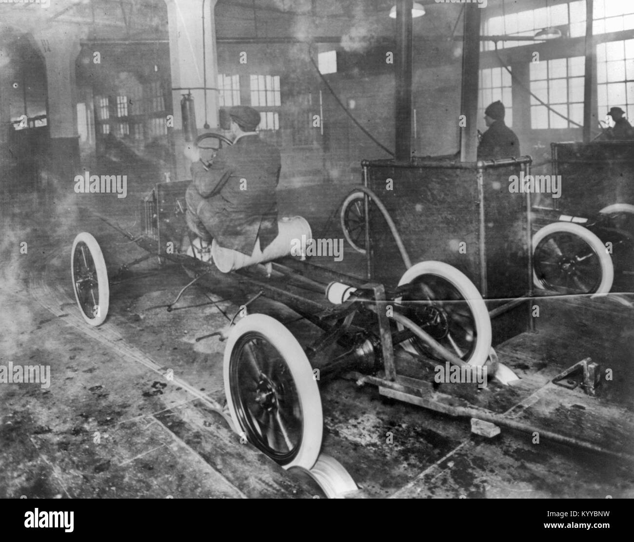 Model T's coming off the assembly line at the Highland Park plant, circa 1900 Stock Photo