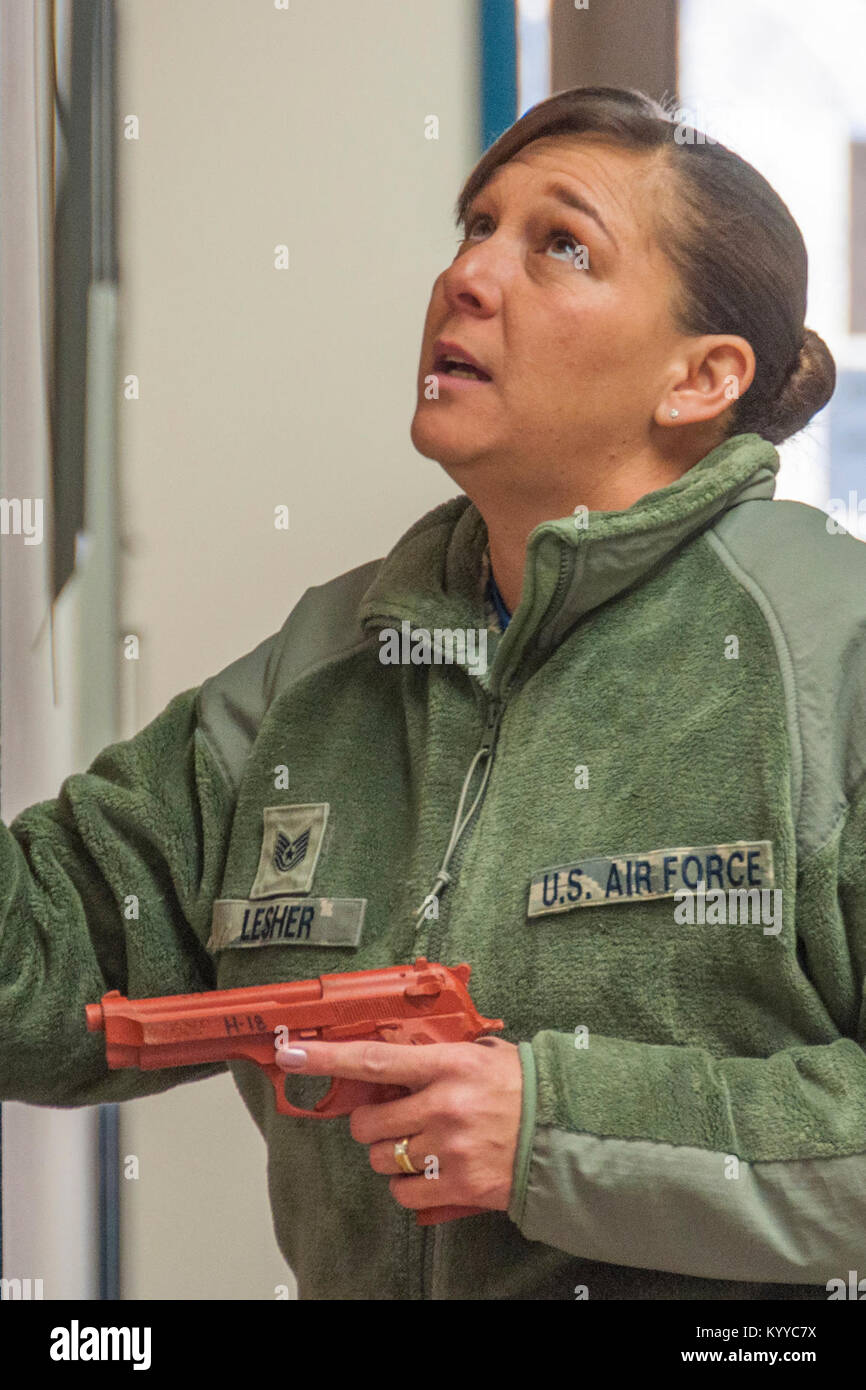 U.S. Air Force Tech. Sgt. Starlight Lesher, 307th Security Forces Squadron craftsman, plays the role of active shooter during a base-wide exercise at Barksdale Air Force Base, La., Jan. 6, 2018.  Such scenarios are held during unit training assemblies to help train Reserve Citizen Airman of the 307th Bomb Wing and their active-duty partners.  The training is monitored by inspectors from both the 307th BW and the 2nd BW Inspector General office. (U.S. Air Force Stock Photo