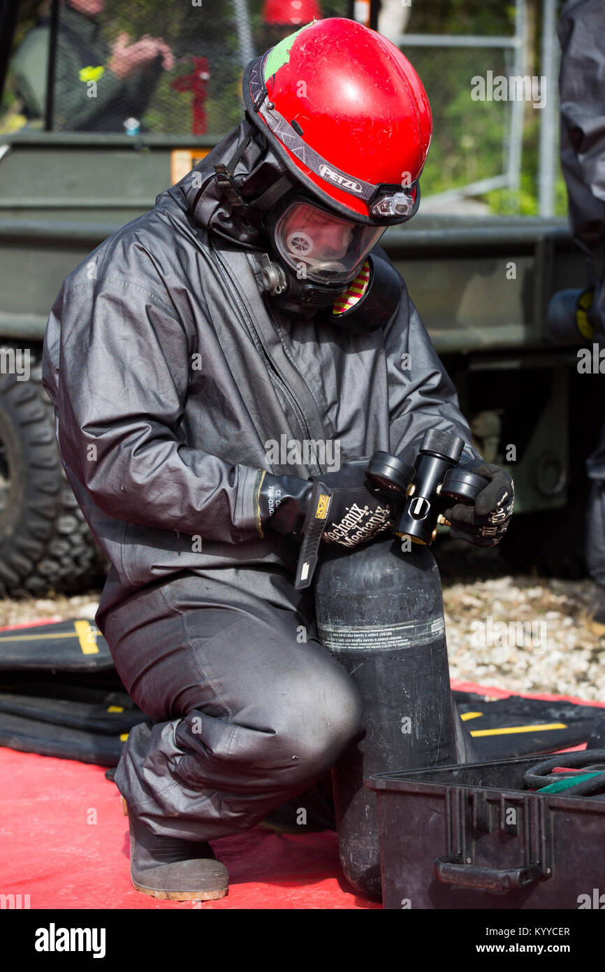 U.S. Army Reserve Soldiers with the 468th Engineer Detachment from Danvers, Massachusetts train with the Miami-Dade Fire Department at the urban search and rescue training area in Miami, FL Jan. 9.  This is the 3rd in a series of Joint Training Exercises between U.S. Army North, U.S. Northern Command and local municipalities across the United States. This JTE focuses on building response capabilities and the seamless transition between the local first responders and the follow-on support provided by the National Guard and Active duty soldiers. (DoD Stock Photo