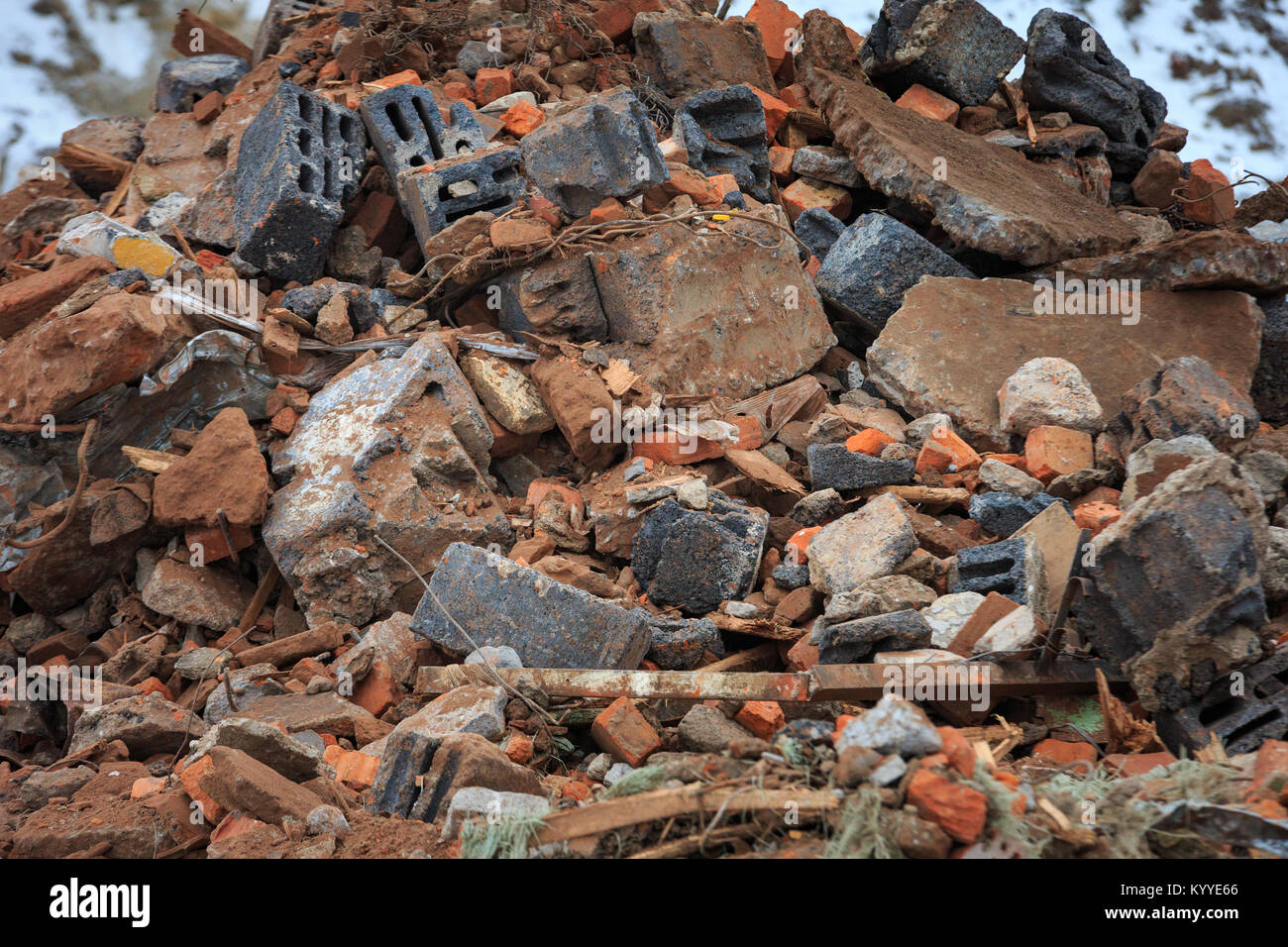 A pile of construction debris is broken brick and concrete Stock Photo ...