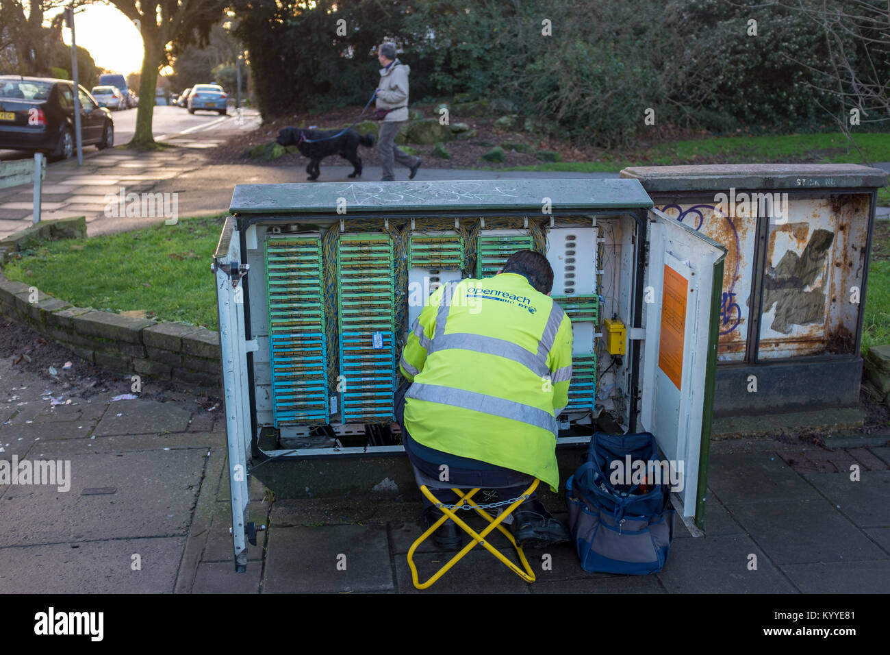 BT Openreach engineer working on a telephone exchange box in north