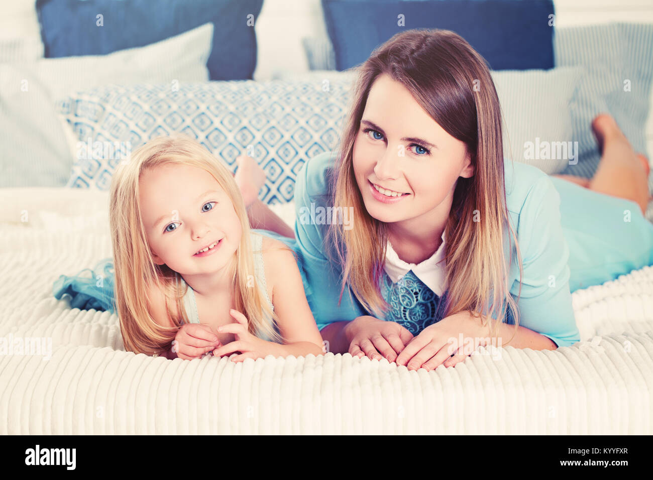 Daughter and Mother Smiling. Happy Woman and Child Girl. Daughter and