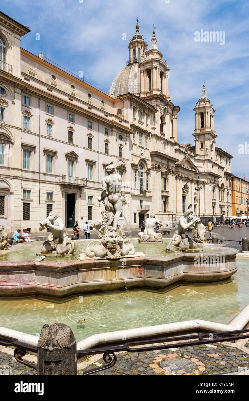 Fontana del Moro (Moor Fountain) and the church of Sant'Agnese in Agone in the Piazza Navona, Rome, Italy Stock Photo