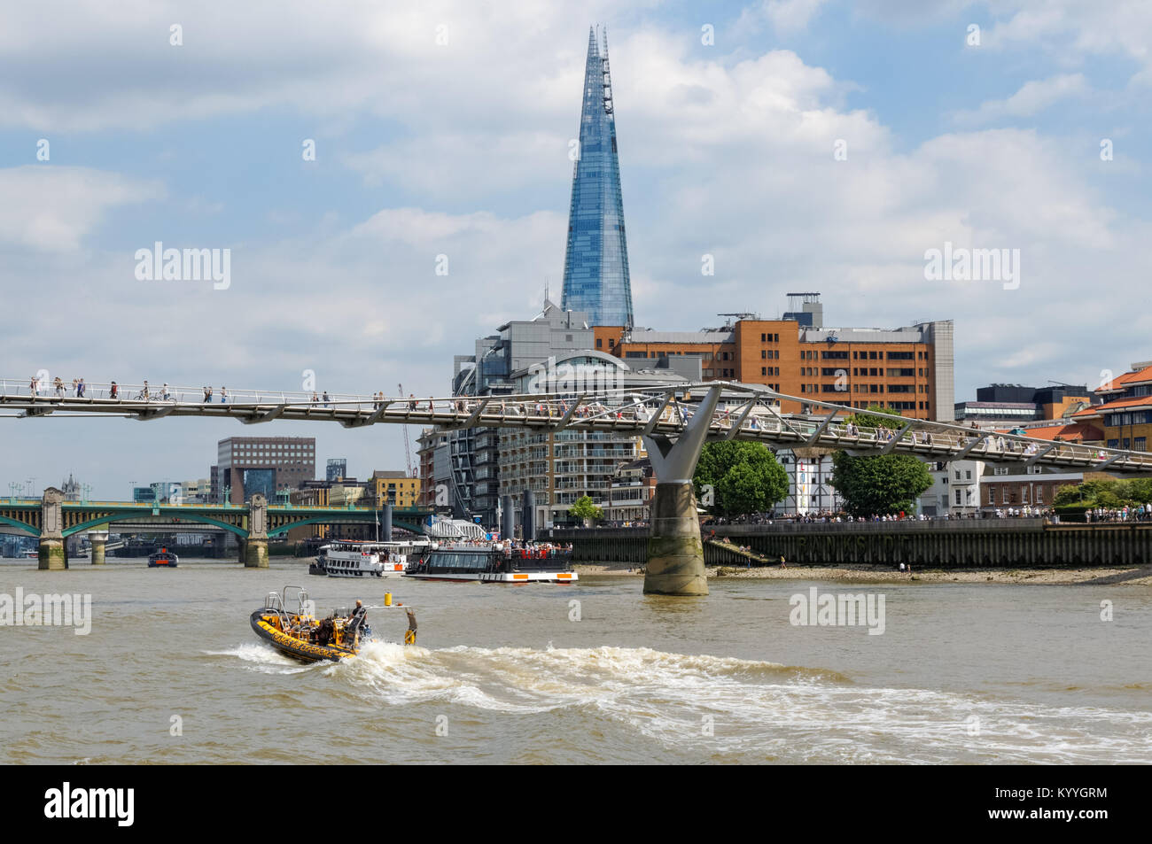River Thames and Millennium Bridge with the Shard skyscraper in the background, London, England, United Kingdom, UK Stock Photo