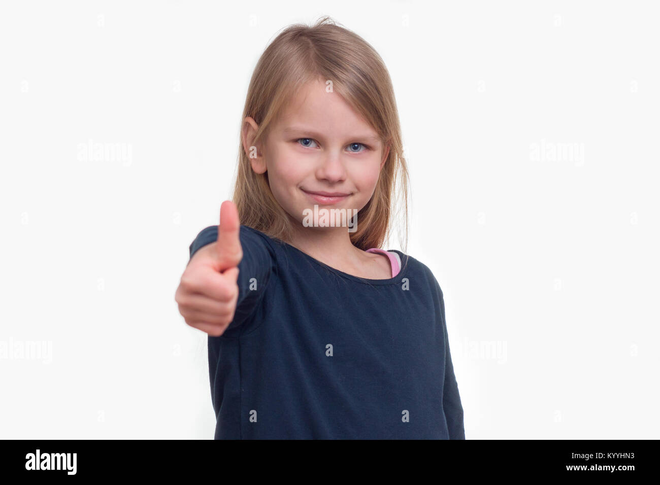 A girl shows his thumb up and gives the sign for Everything OK, Portrait Stock Photo