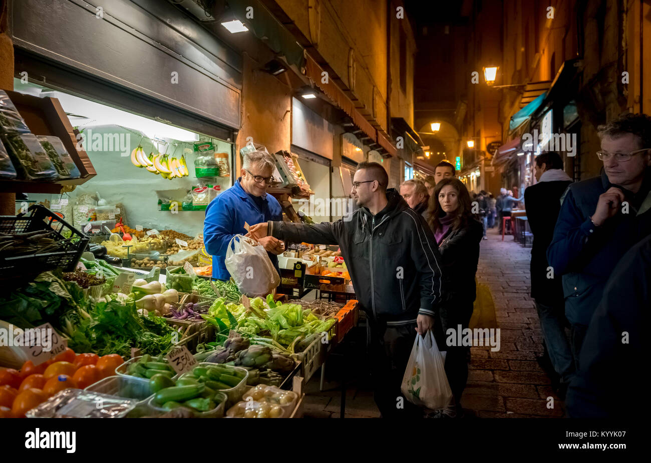 Vegetable market stall shop in Via Pescherie Vecchie night market, Bologna, Italy Stock Photo